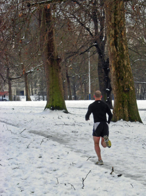 Real person jogging through a park